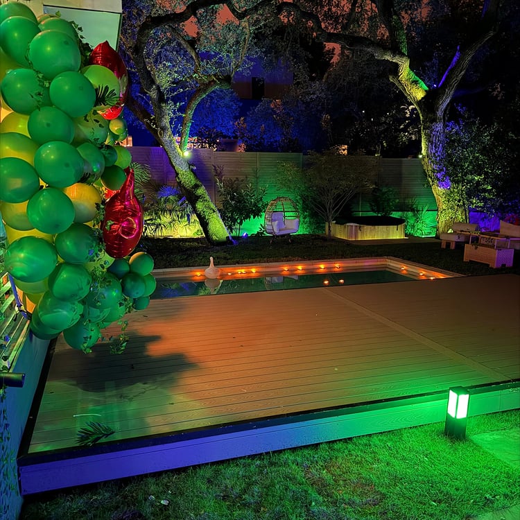 Austin_Home_Colorful_backyard_party_scene_at_night-1080x1080